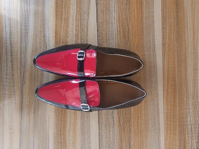 Black and Red Shoe With Shoe Belt